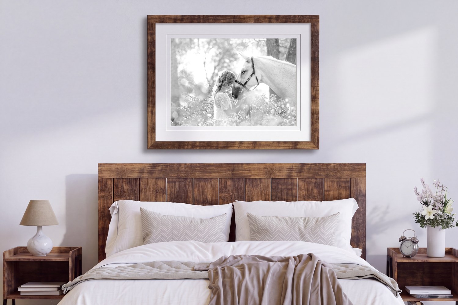 Framed white horse print in a wood-panelled bedroom.